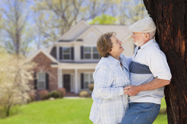 Happy Senior Couple in Front Yard of House - Photo, Image
