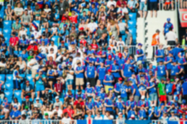 Blurred crowd of spectators on a stadium - Photo, Image