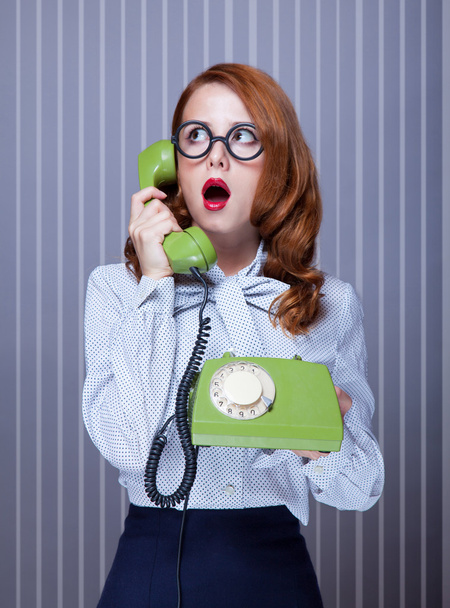 Women with green telephone - Photo, Image