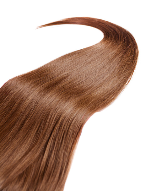 lock of brown hair - Фото, зображення