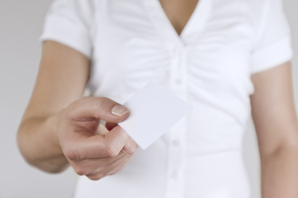 Woman Gives Away Business Card - Фото, зображення