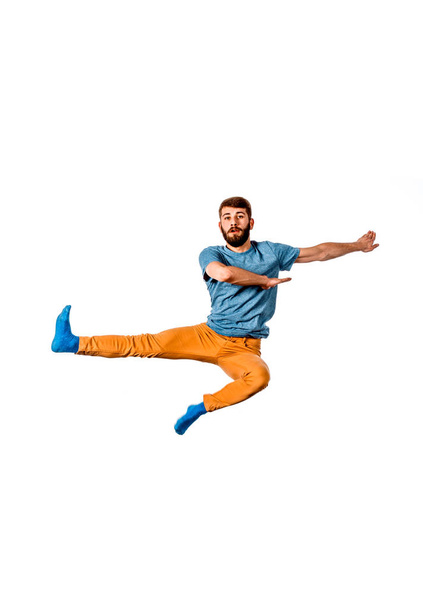 elegantní mladý muž tančí po celé délce - Fotografie, Obrázek