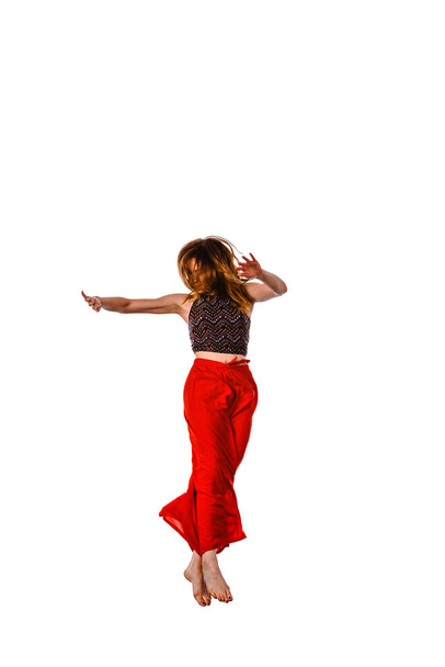 Woman hip hop dancer over white background - 写真・画像