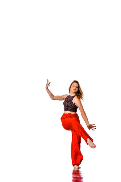 Style dancer posing on a studio white background - Fotó, kép