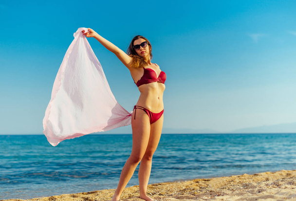 Beach bikini woman beauty on summer holidays vacation - Foto, Imagem