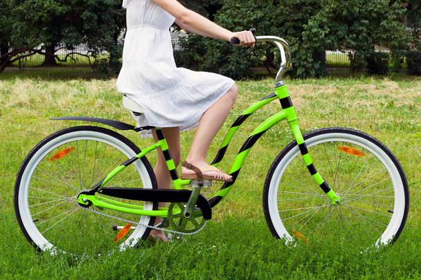 Woman riding in the park - Photo, image