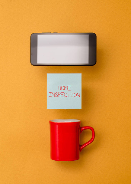 Word writing text Home Inspection. Business concept for Examination of the condition of a home related property Coffee cup colored sticky note electronic device yolk color background. - Photo, Image