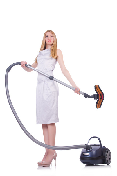Young woman with vacuum cleaner on white - Φωτογραφία, εικόνα