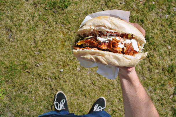 holding doner in the hand - Photo, Image