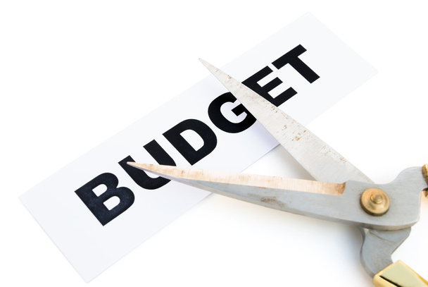 Бюджет и ножницы с обрезанной дорожкой
 - Фото, изображение
