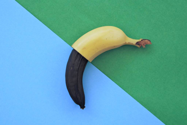 Halves of banana on two different backgrounds  - Photo, Image
