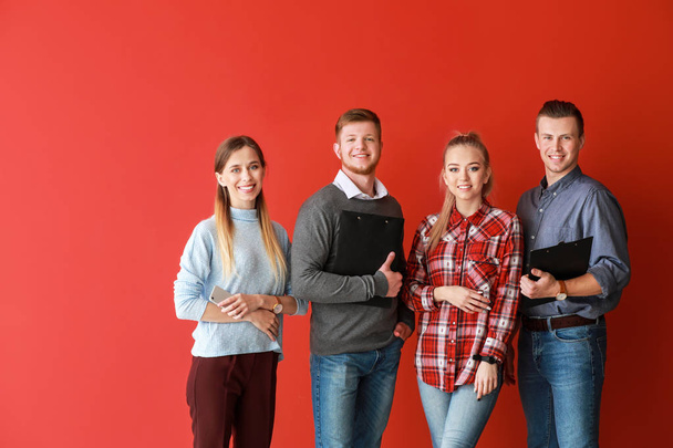 Group of young business people on color background - Photo, Image