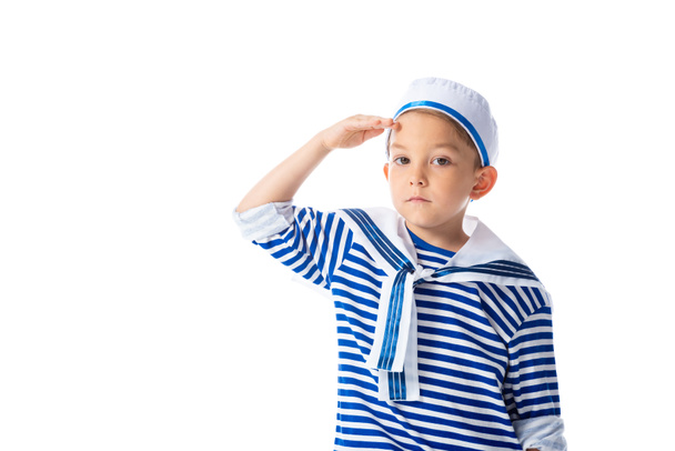 serious preschooler child in sailor costume saluting and looking at camera isolated on white - Photo, Image