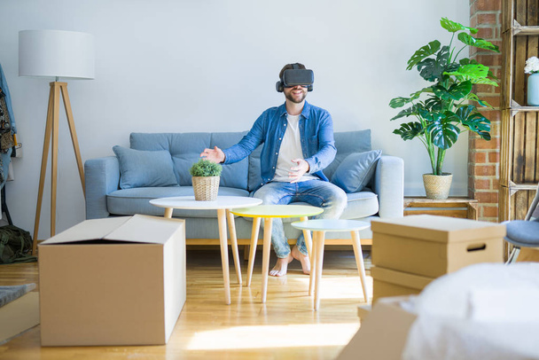 Junger Mann mit Virtual-Reality-Brille spielt eine Simulation - Foto, Bild