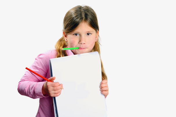 Child with color pencils - Foto, Imagen