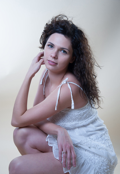 Sensual woman in a white sundress - Фото, зображення