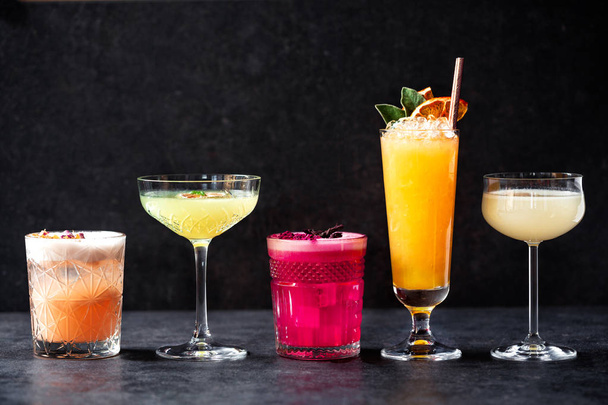 Delightful variously colored refreshment cocktail drinks  - Foto, Imagem