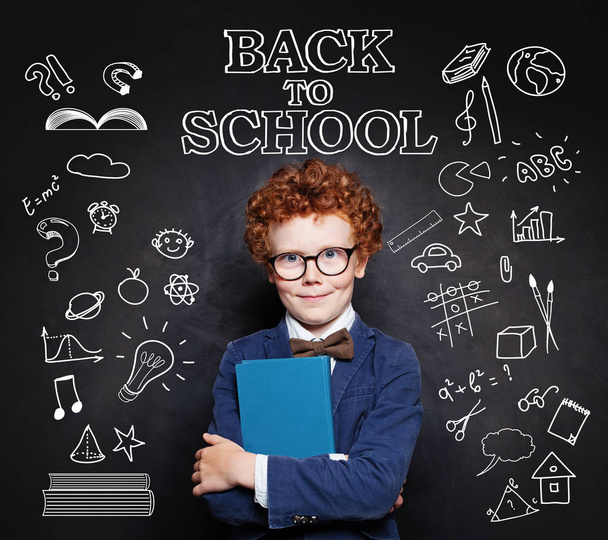 Curious kid school boy on chalkboard background. Back to school  - Foto, afbeelding