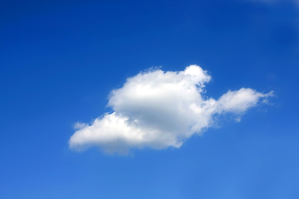 Single cloud in blue sky - Photo, Image