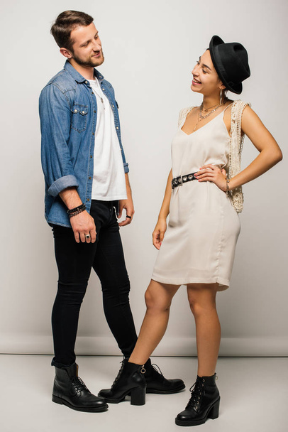 full length view of beautiful couple in stylish clothes looking at each other - Foto, immagini