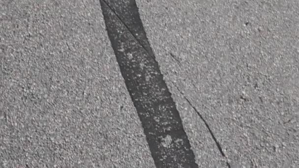 tar on asphalt road bitumen pattern - Filmati, video