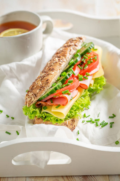 Fresh sandwich with ham, lettue and chive for breakfast - Фото, изображение