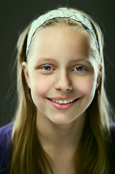 Portrait of a cute smiling teen girl - Photo, image
