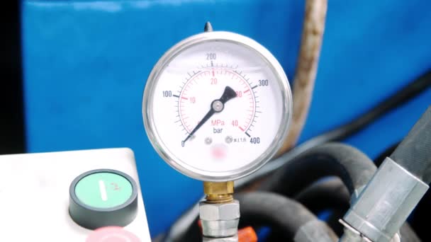 Manometer with arrow on industrial equipment. Pressure meters in workshop - Footage, Video