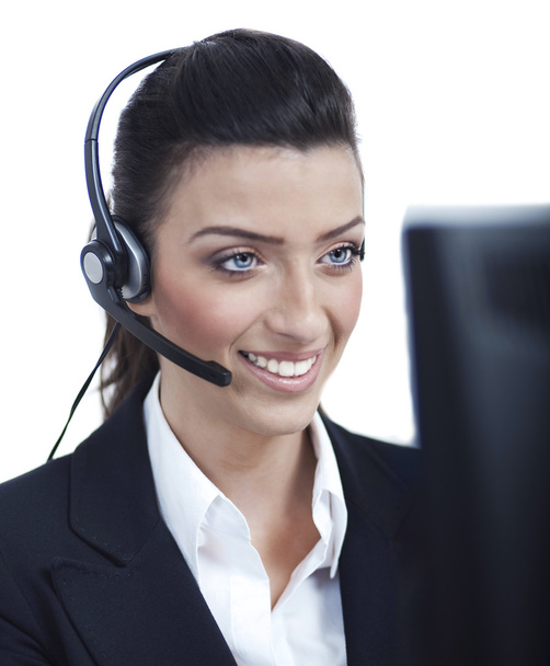Young blond business woman with headset - Foto, imagen