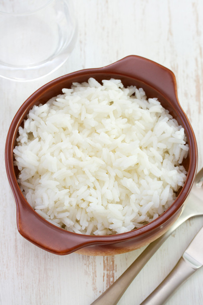 Boiled rice in dark bowl - Fotografie, Obrázek