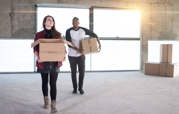 multiethnic business team carrying cardboard boxes - Foto, immagini
