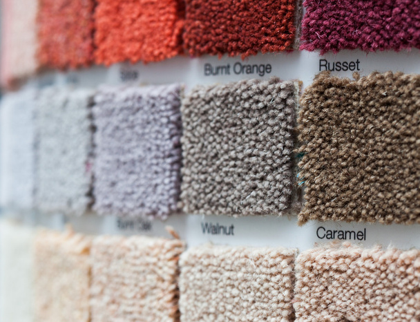 Expositor de alfombras en una tienda minorista
 - Foto, Imagen