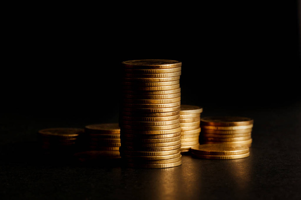 Stack of Gold Coin on Black Background. - Photo, Image