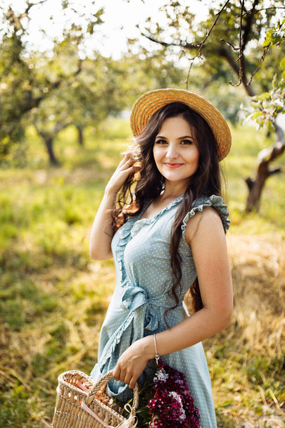 Beautiful young  woman  in summer park  - Fotó, kép