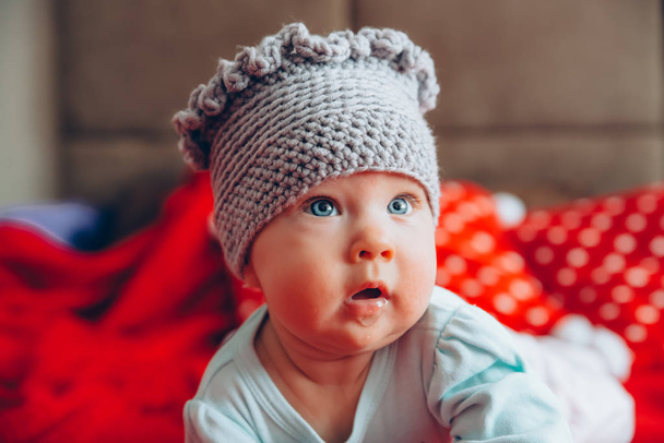 children's fashion - hand-made woolen hat - Фото, изображение