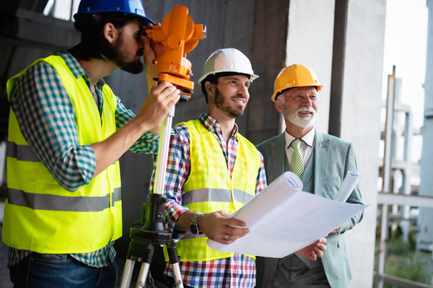 Group of construction engineer working in construction site and management in the construction site - Фото, зображення