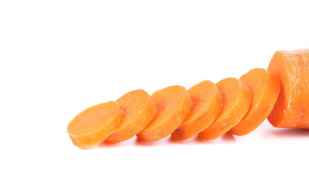 Raw carrot slices on a white background - Fotoğraf, Görsel