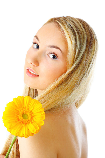 Young woman with a flower - Foto, Imagem