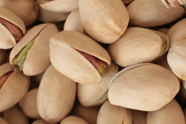 Macro foto de pistachos, un montón de nueces, Macro vista de un pistacho
 - Foto, imagen