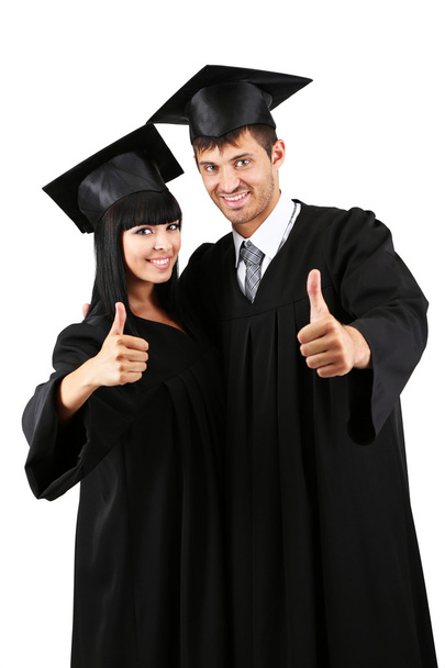 Two happy graduating students isolated on white - Fotoğraf, Görsel