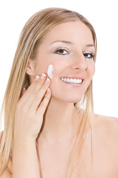 Woman creaming face - Zdjęcie, obraz
