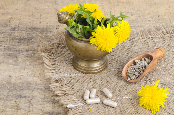 Herbals in mortar and modern medicines, herbal medicine in capsules.  - Photo, Image
