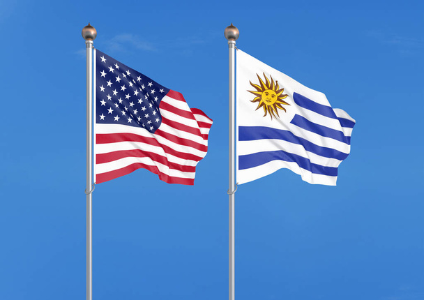Ηνωμένες Πολιτείες της Αμερικής vs Ουρουγουάη. Πυκνές έγχρωμες μεταξένια σημαίες της Αμερικής και της Ουρουγουάης. εικονογράφηση 3D σε φόντο ουρανού-απεικόνιση - Φωτογραφία, εικόνα