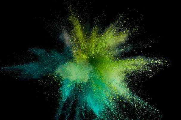 Colored powder explosion. Abstract closeup dust on backdrop. Col - Photo, Image