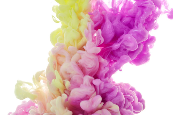 Ink in water. Splash paint mixing. Multicolored liquid dye. Abst - Фото, изображение