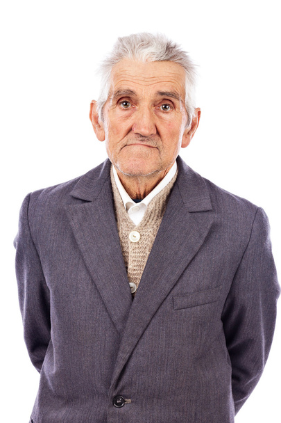 Portrait of an old man looking at camera - 写真・画像
