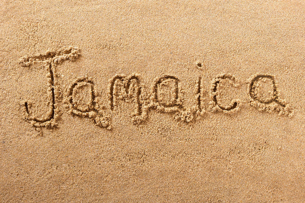 Jamaica handwritten beach sand message - Foto, Imagem