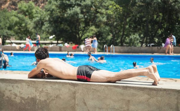 Caucasian man in the swimming pool.  - Valokuva, kuva