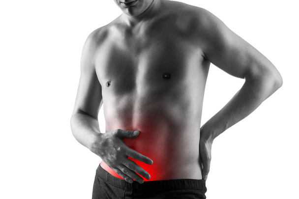 Man with abdominal pain, stomach ache isolated on white background - Foto, imagen