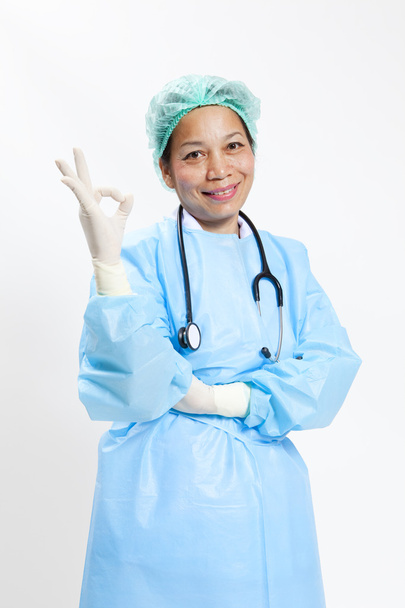 Happy smiling female doctor with okay gesture, isolated on white background - Fotoğraf, Görsel